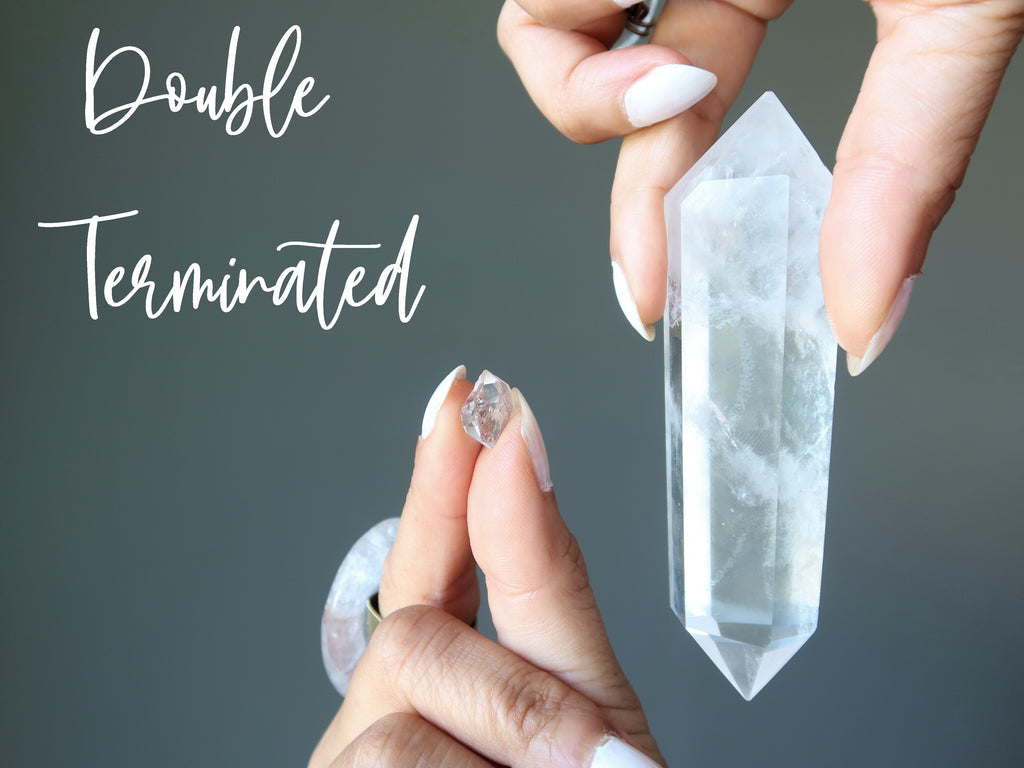 a natural and a polished double terminated quartz