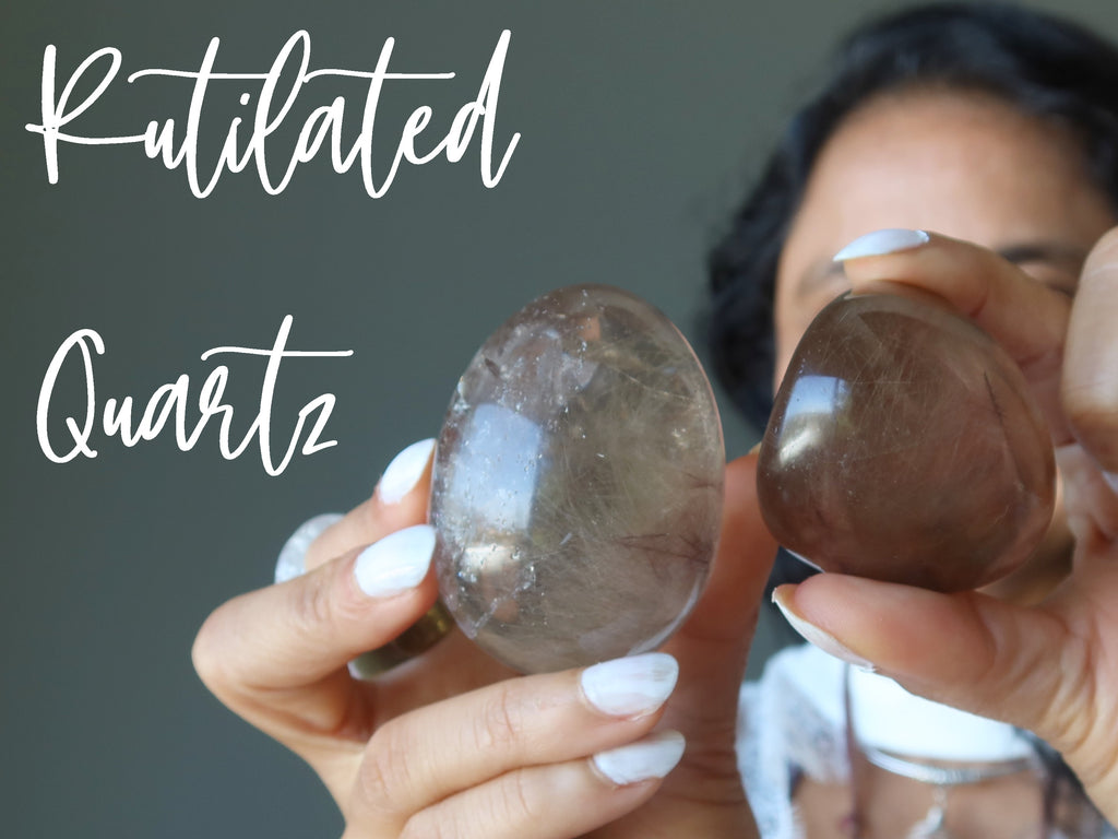 rutilated quartz egg and palm slab