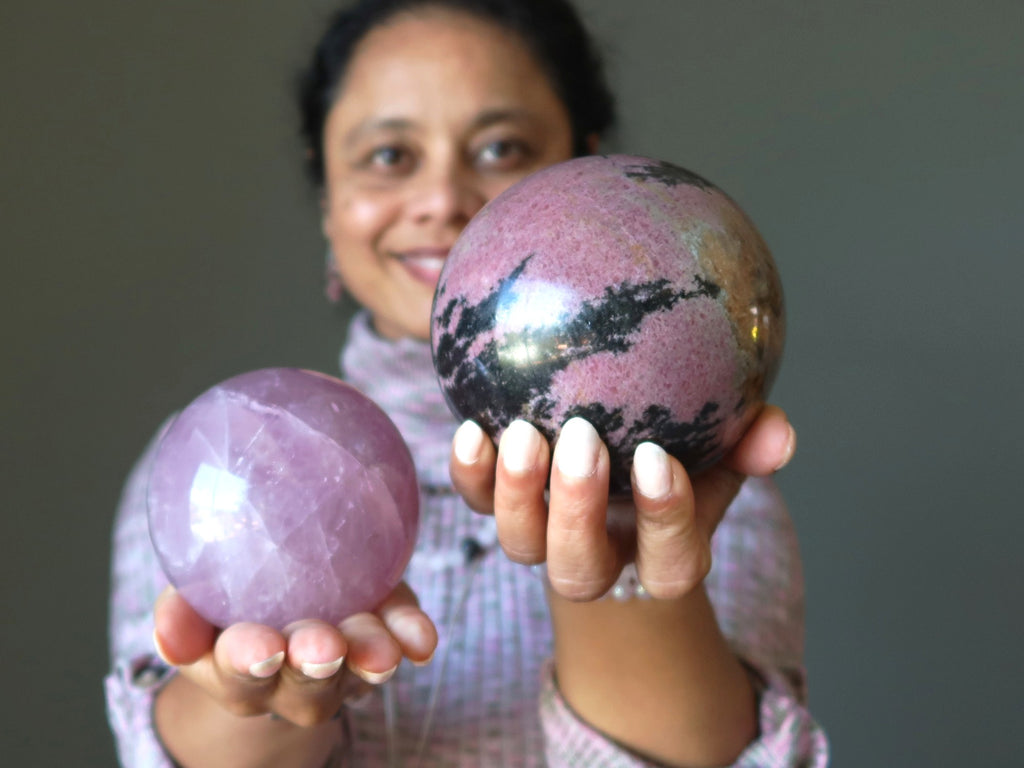 rose quartz and rhodonite spheres