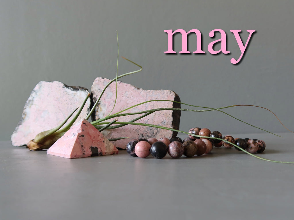 rhodonite stones and word "may"