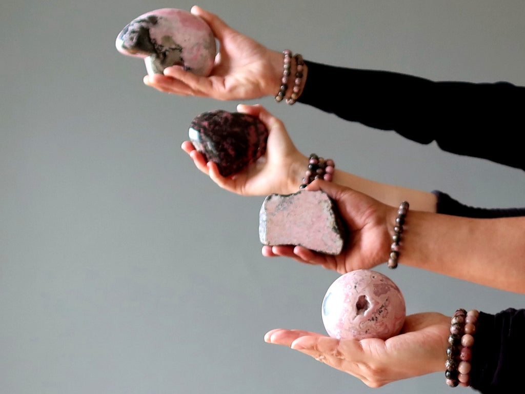 rhodonite in hands