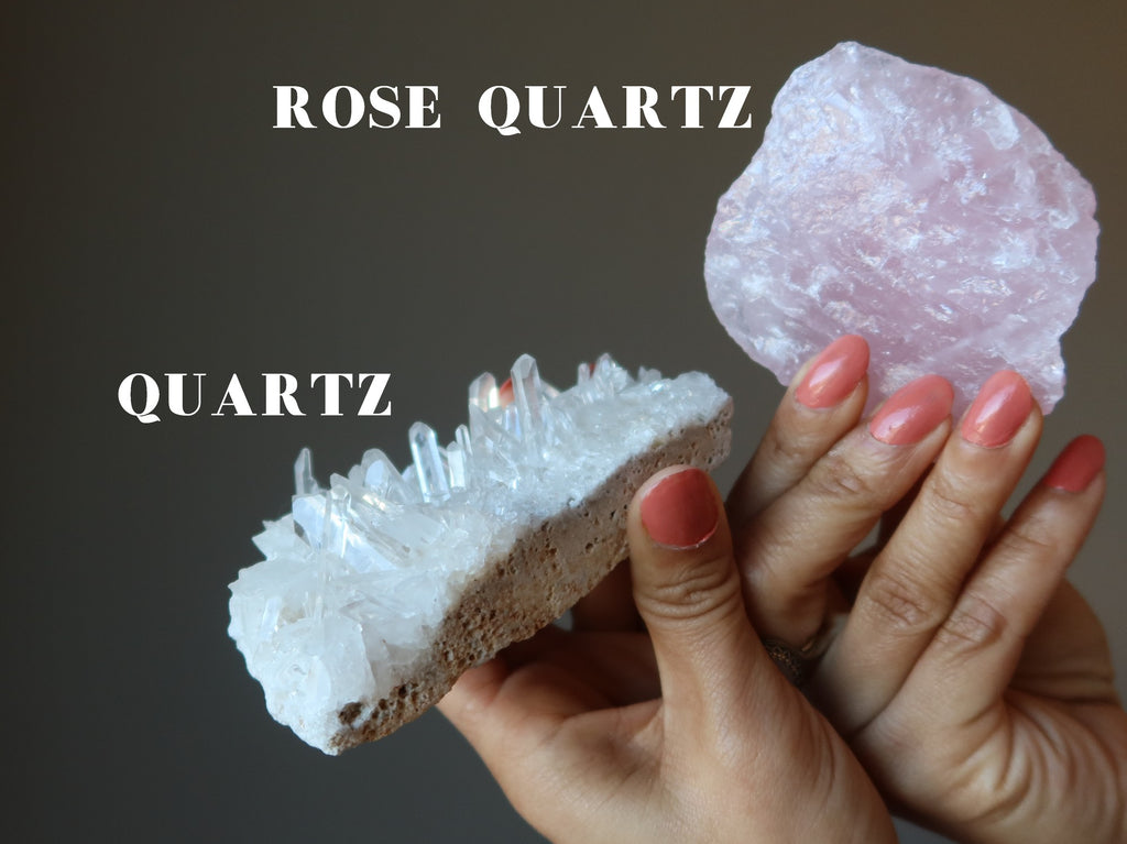 hands holding a quartz cluster and a rose quartz raw stone