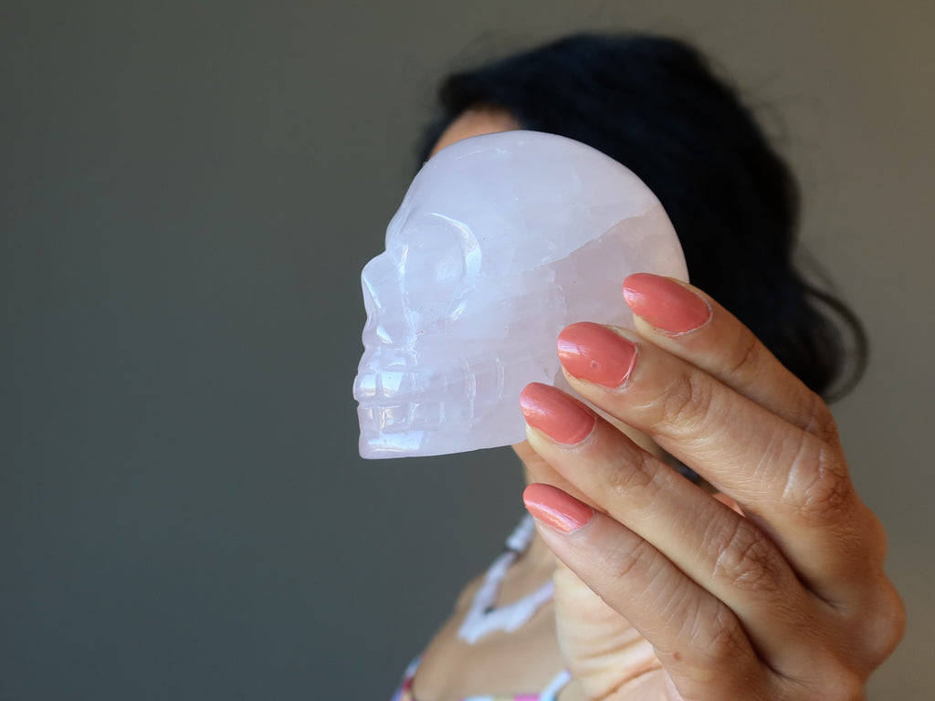 side profile of a pink rose quartz skull