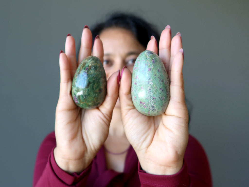 sheila of satin crystals holding two ruby fuchsite eggs