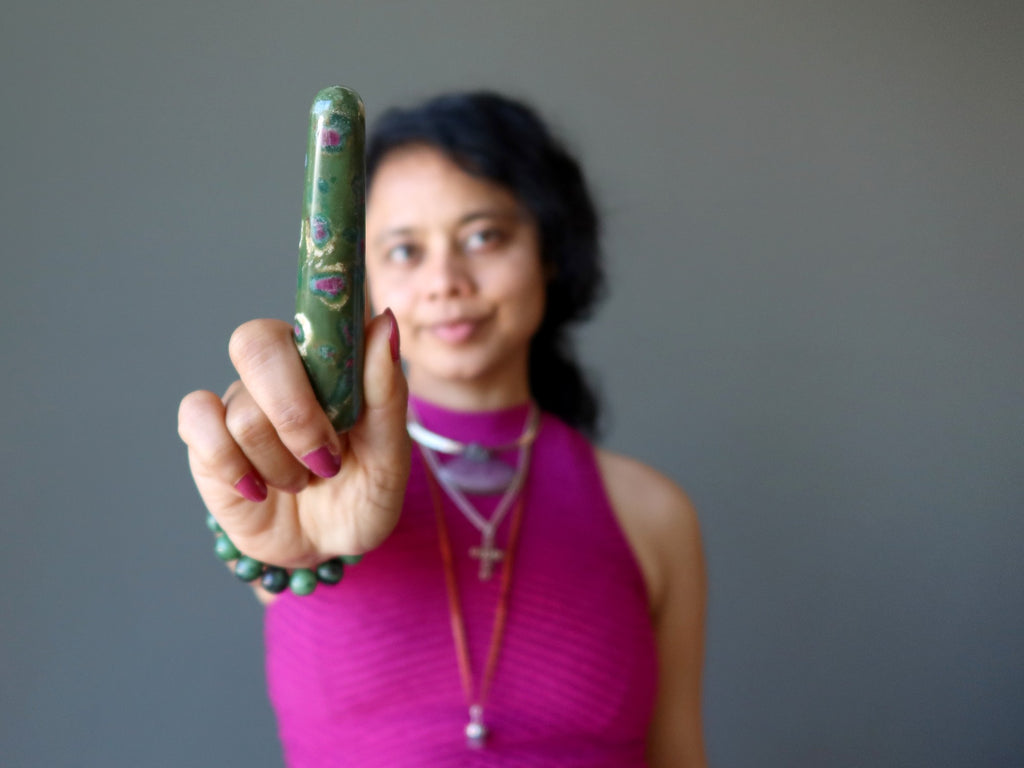 sheila of satin crystal holding ruby fuchsite massage wand