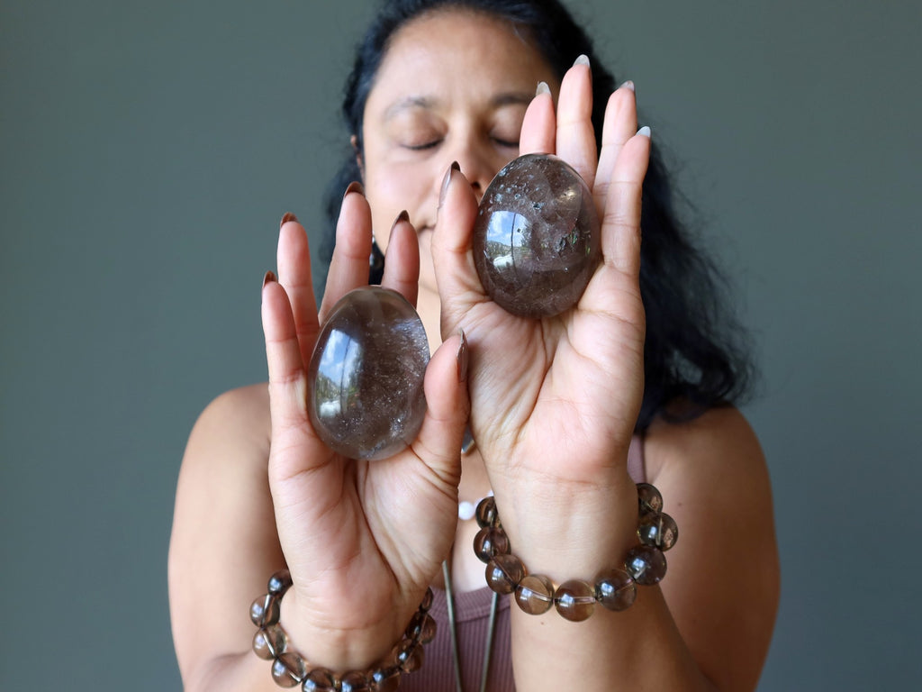 sheila of satin crystals meditating with smoky quartz eggs