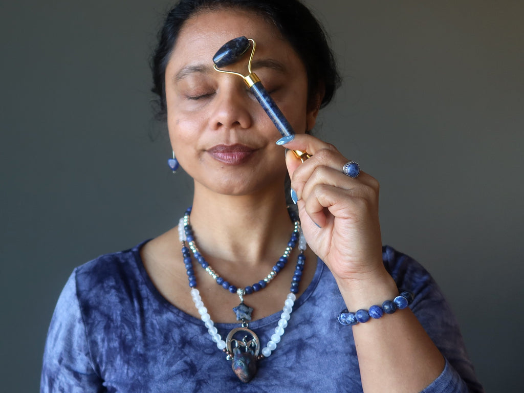 sheila of satin crystals using sodalite facial roller wand