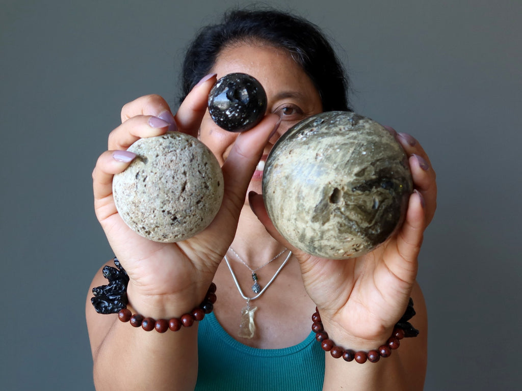 three zhamanshin impactite spheres