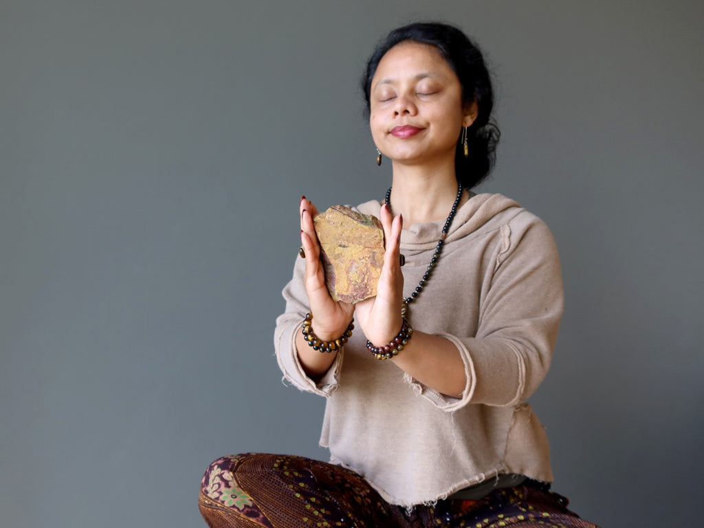 sheila of satin crystals meditating with tigers eye stone