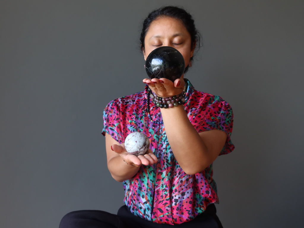 sheila of satin crystals meditating with tourmaline spheres