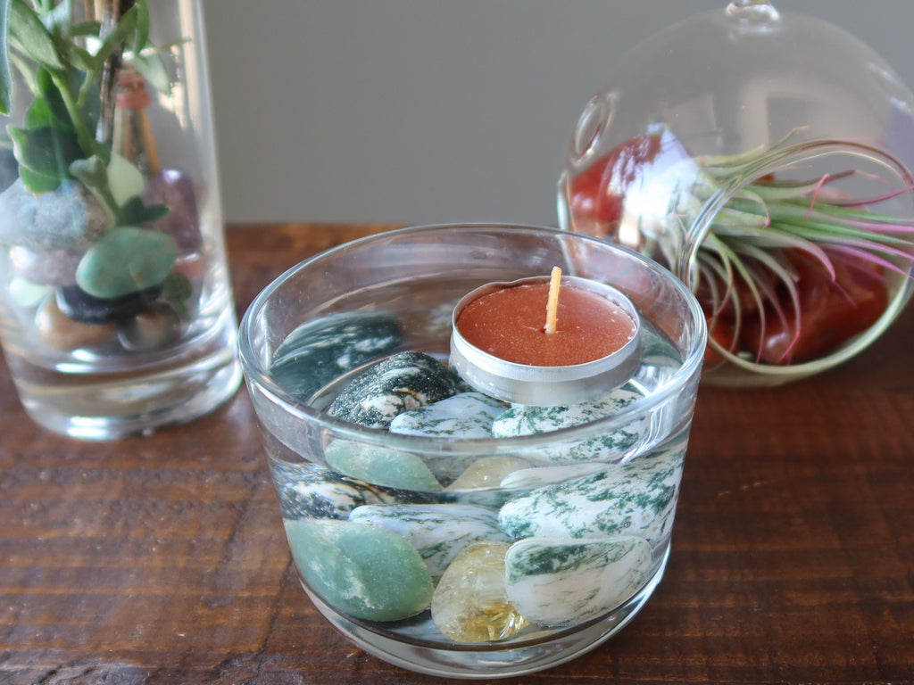 tumbled stones in clear glass