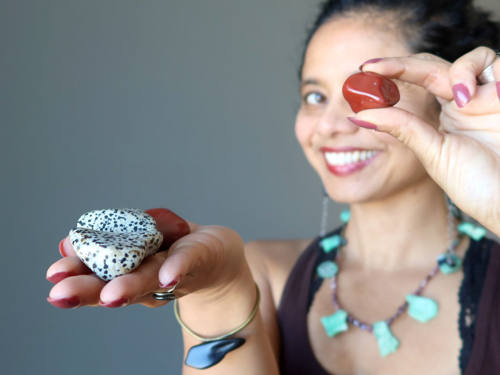 sheila of satin crystals holding tumbled stones