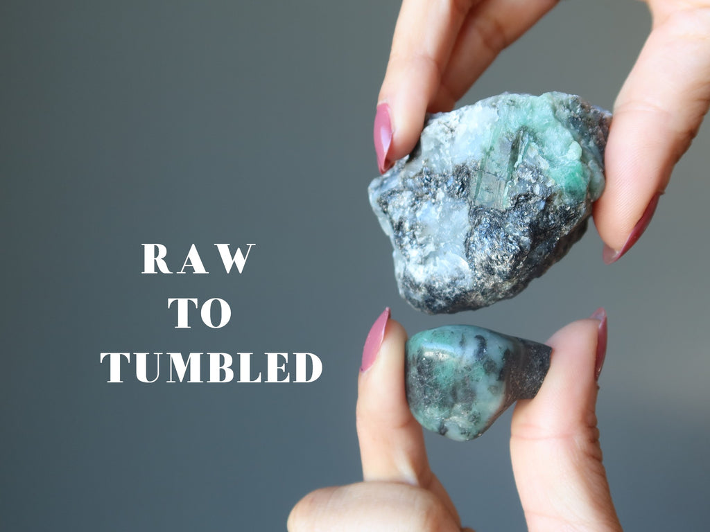 raw and tumbled green emerald stones