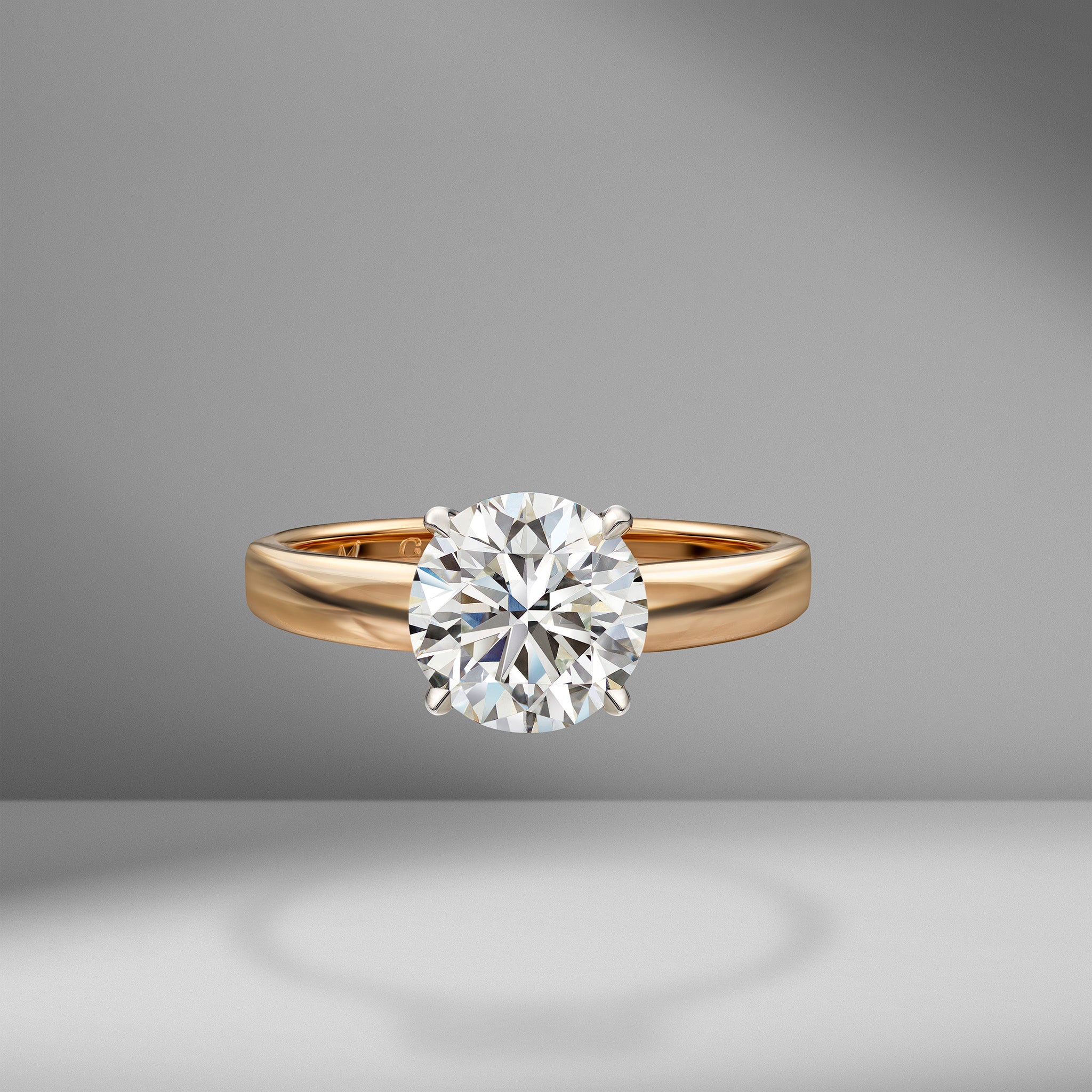 Modern Classic Round Brilliant Two-Tone Solitaire