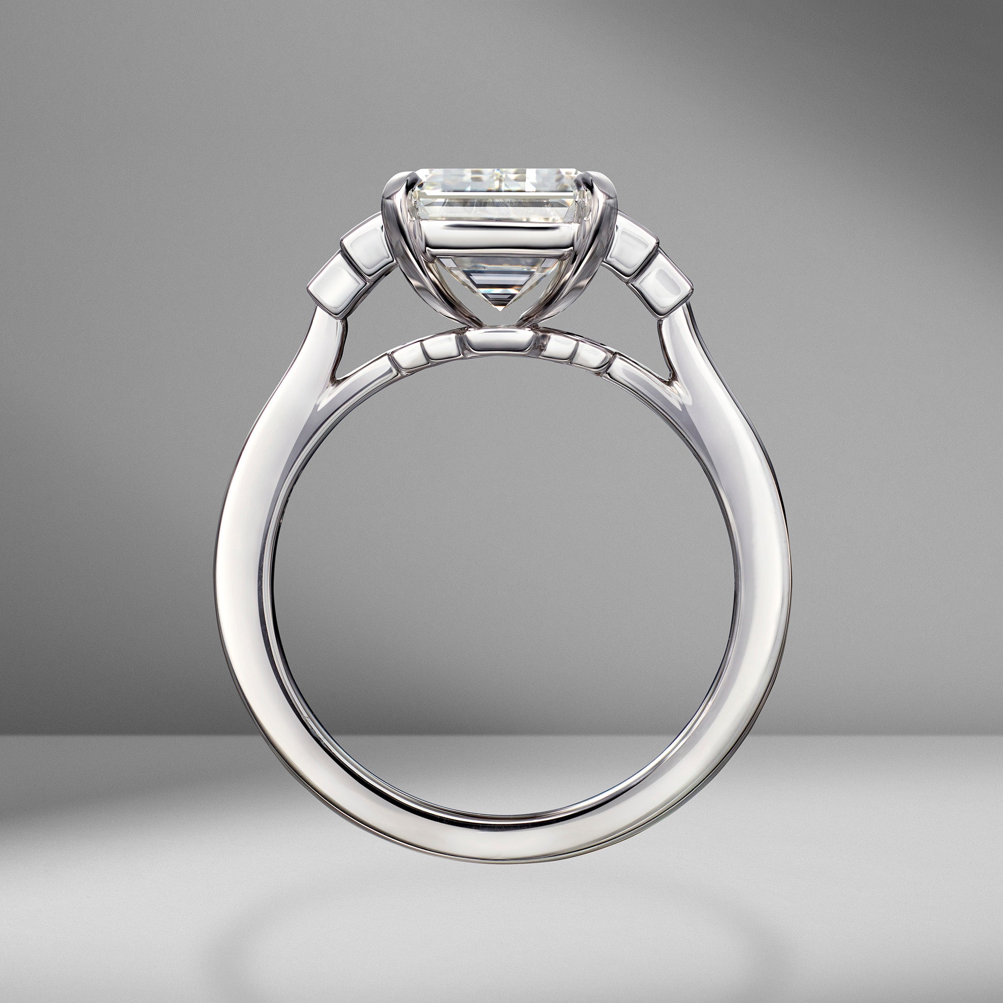 Emerald Cut Engagement Ring with Side Step Baguettes