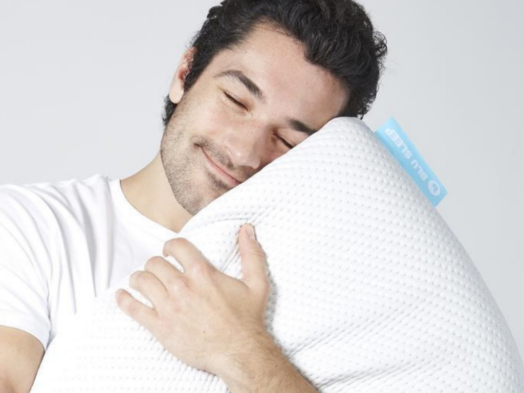 man with a pillow, Haven Sleep Co Pillow