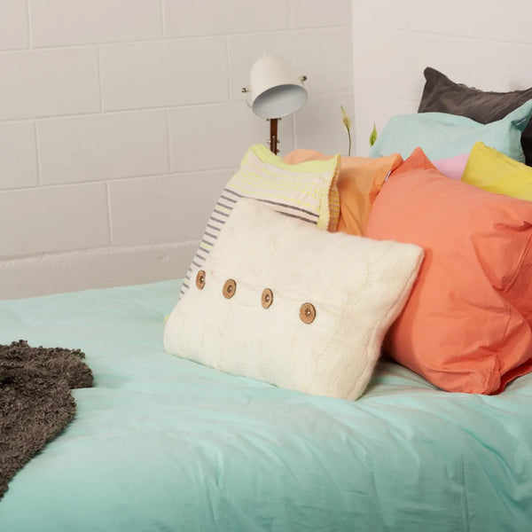 Bed in dorm style room. very colourful!