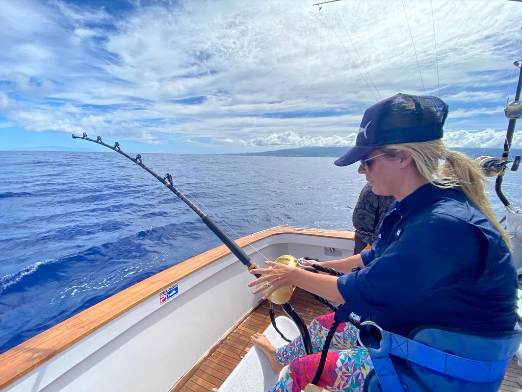 Dana Susina with her lucky sundot marlin trucker hat