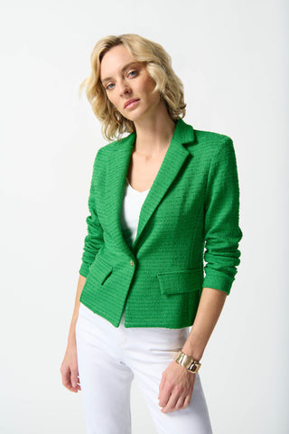 Fabulous green blazer. Classic cut made from tweed style fabric. Stunning.