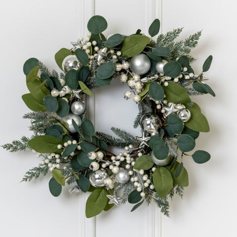 Green door wreath with silver details