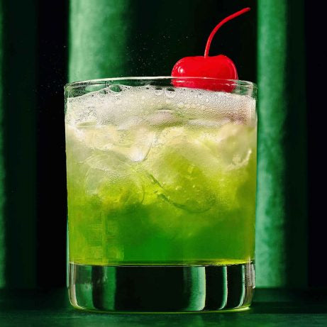 The Grinch Cocktail for Christmas Step by Step recipe for bright green Grinch Christmas cocktail