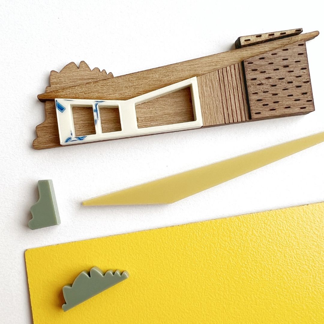 yellow house brooch being made