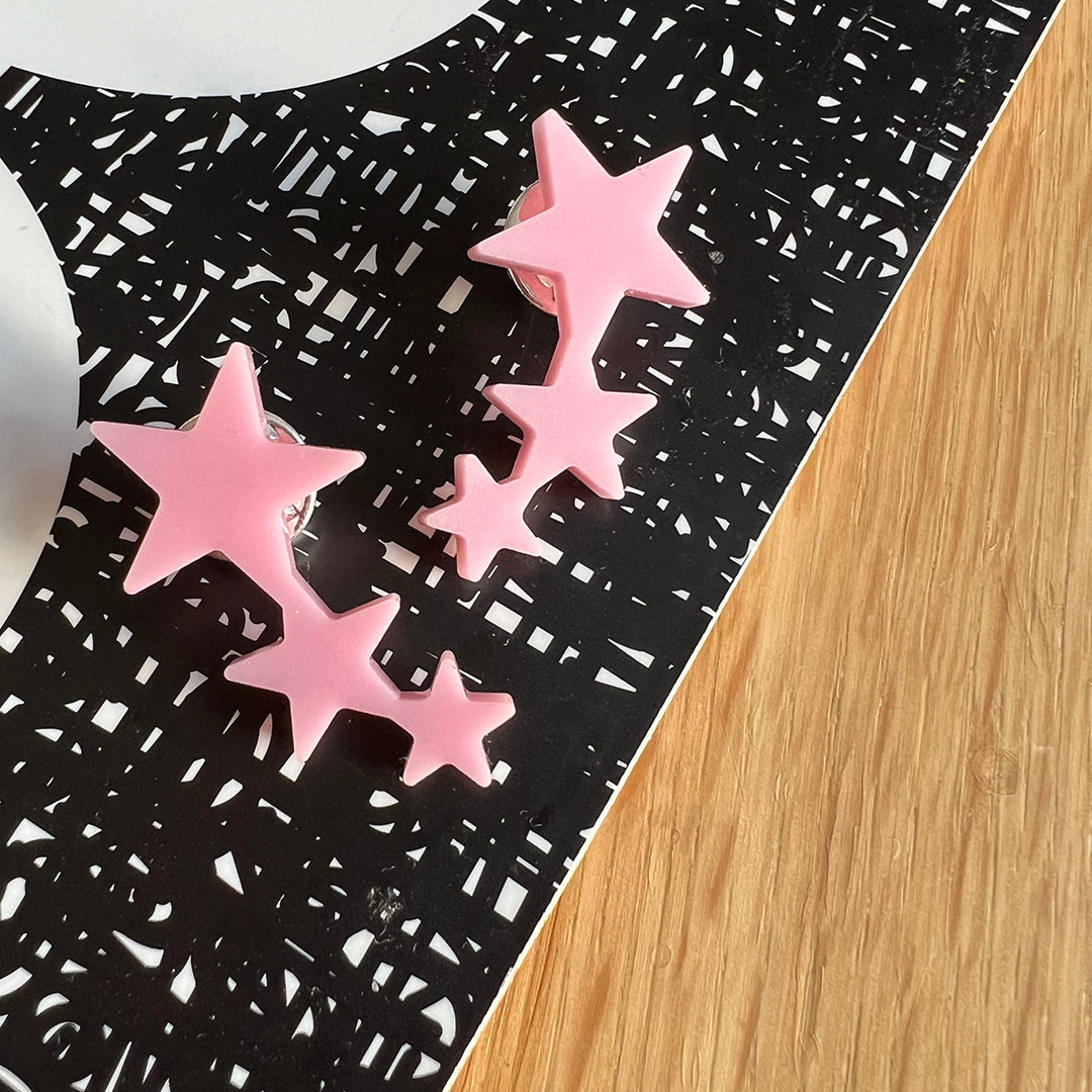 Set of two star pins in matt pink acrylic