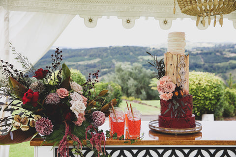 cake and bar setup for a wedding by exotic soirees marquees