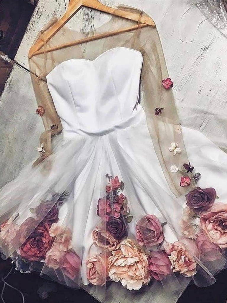 white dress with flowers on it