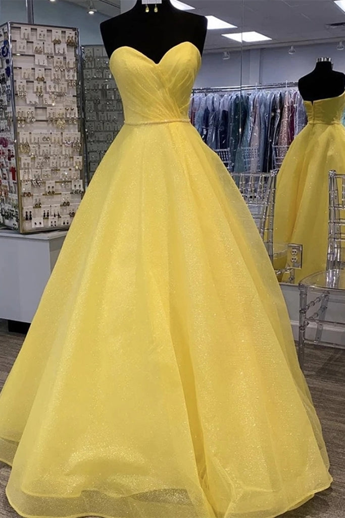 strapless yellow prom dress