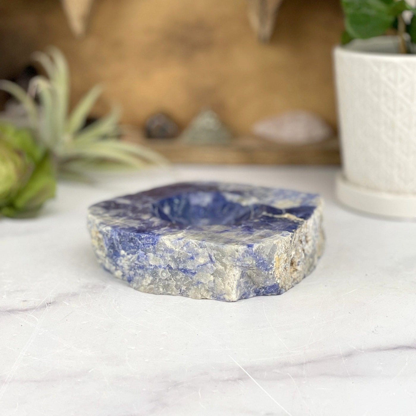 side view of sodalite polished soap dish for thickness