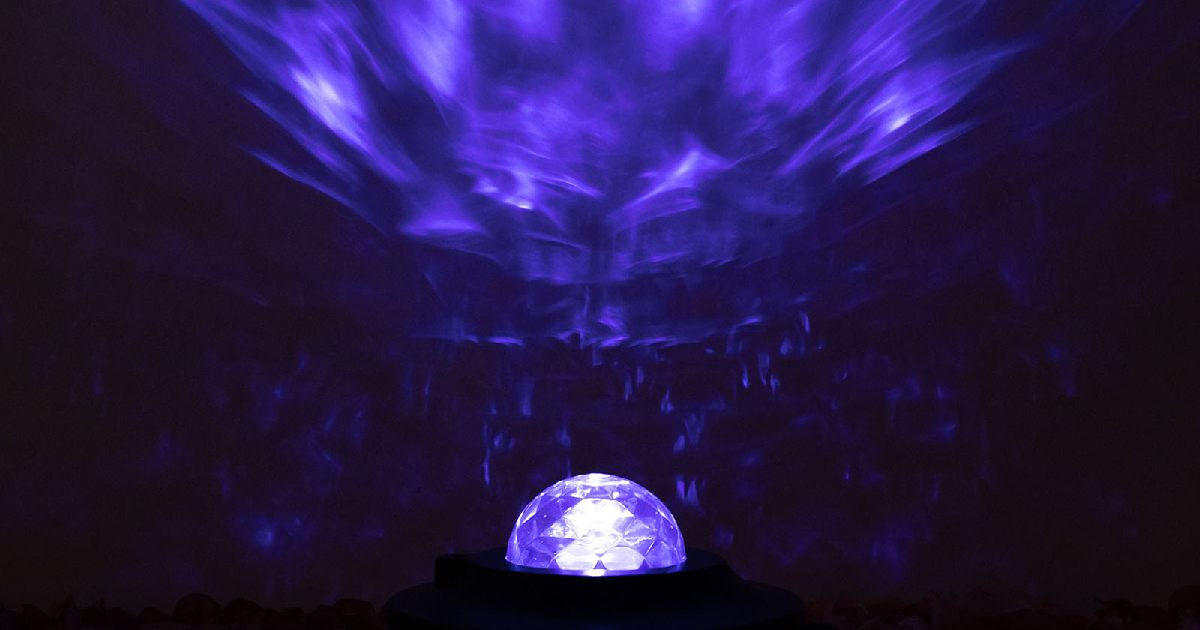 Best lights for party: Purple projector casting vibrant wave patterns
