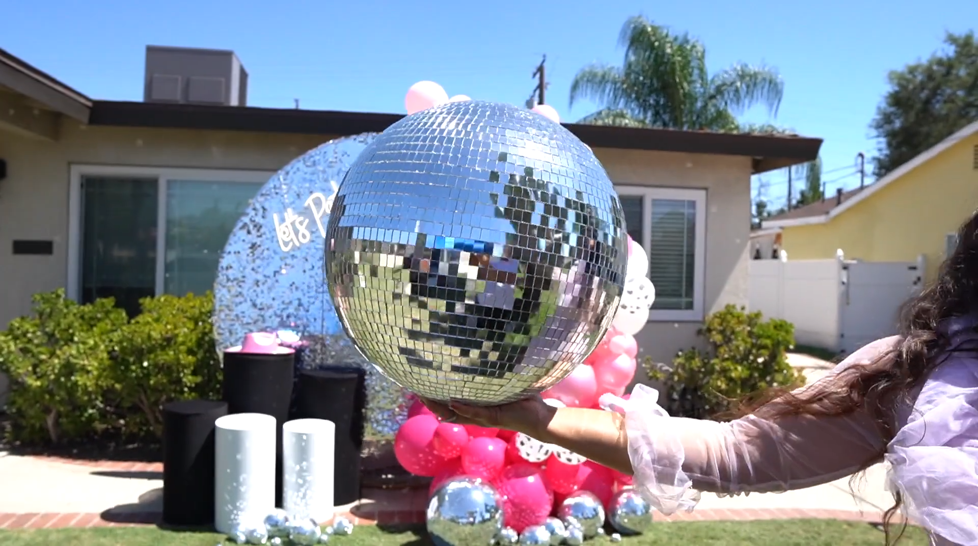 Disco ball decor for a cowgirl rodeo theme party