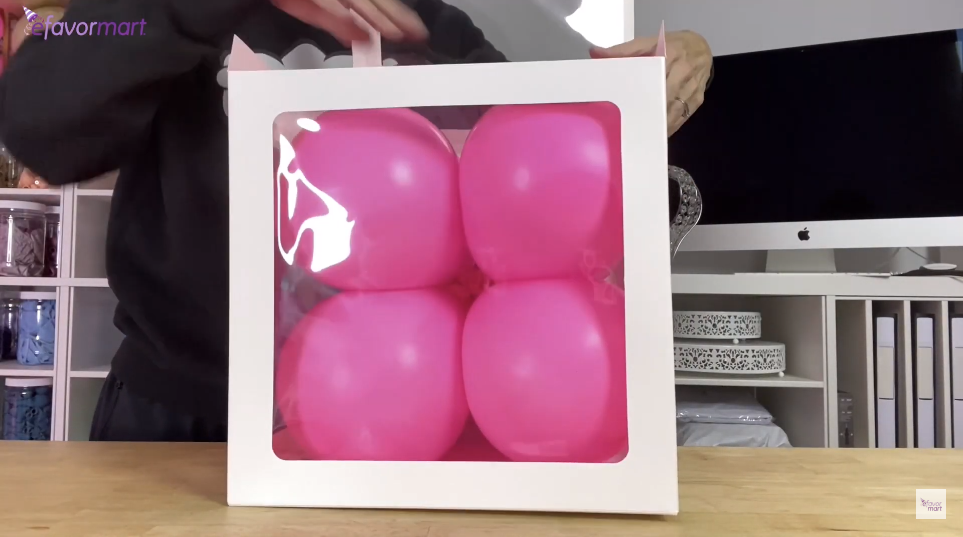 Pink balloons inside the display box