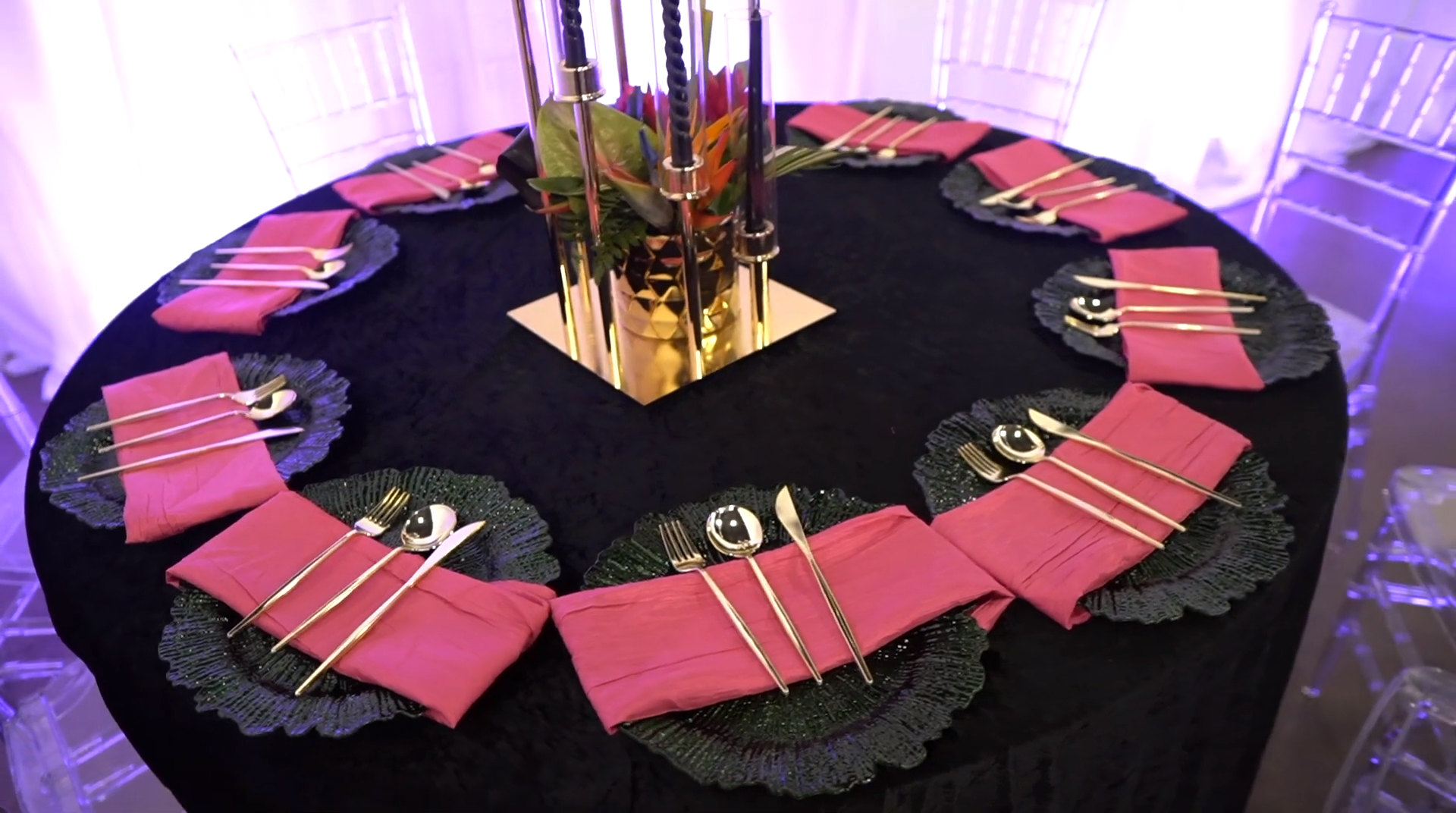 Table setting with charger plates, utensils, and dinner napkins