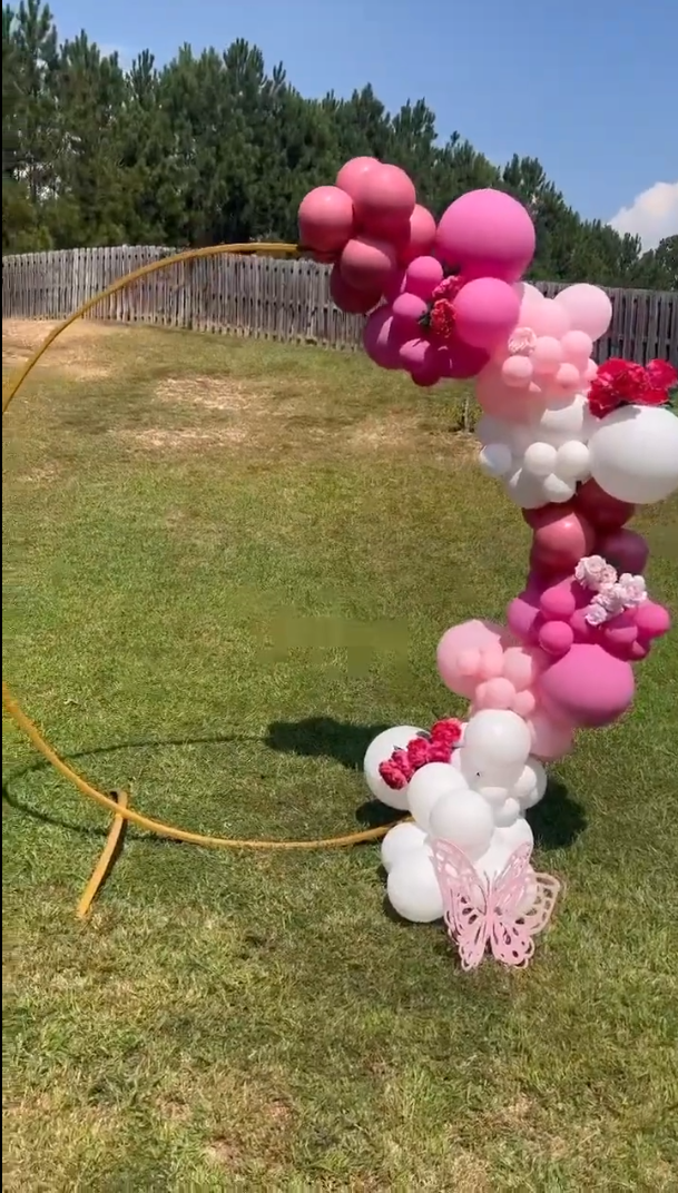 Balloon arch stand with butterfly decals