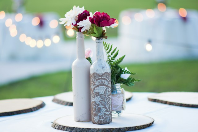 Wine bottle vases with flowers