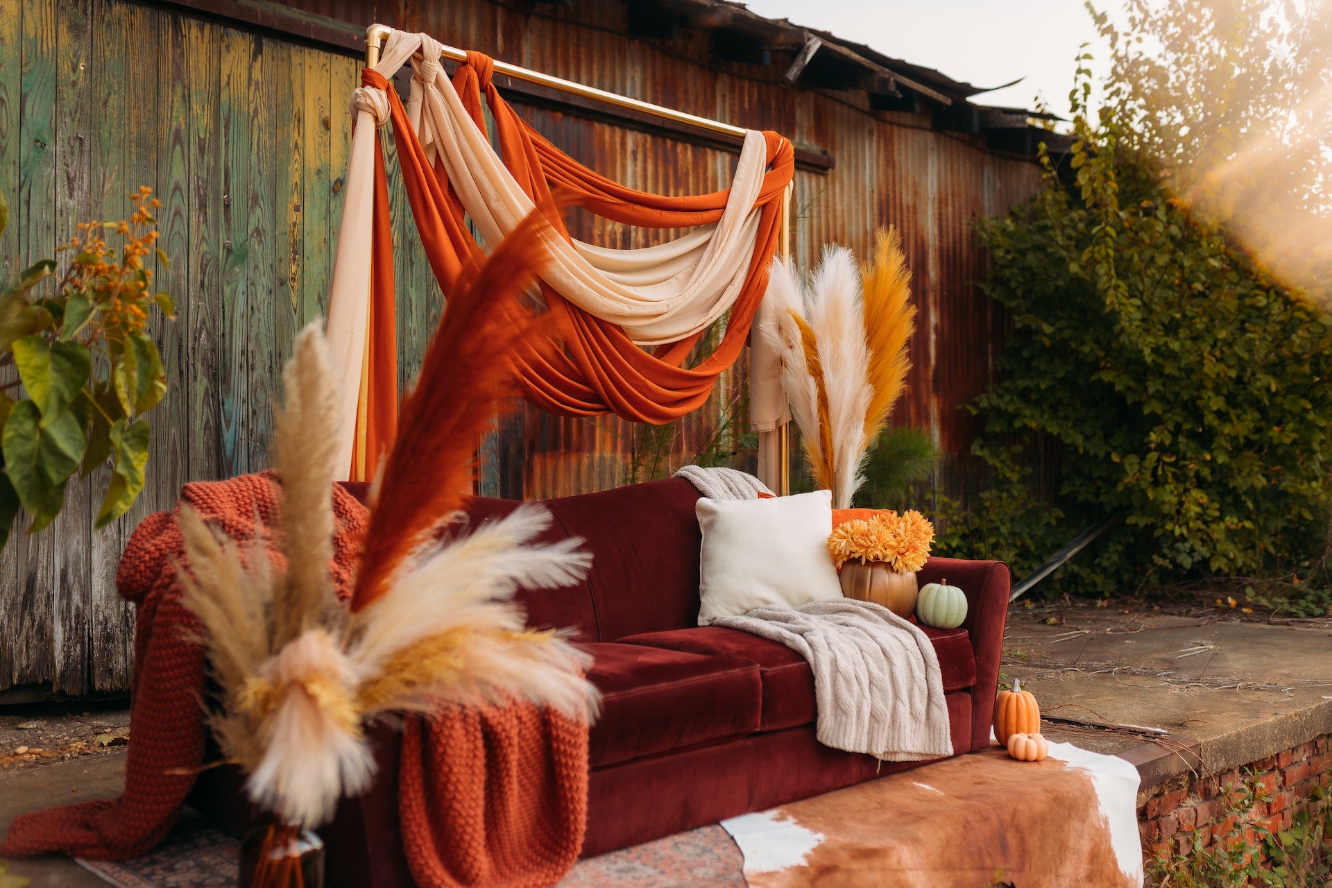 Wedding arch designed with fabrics and pampas