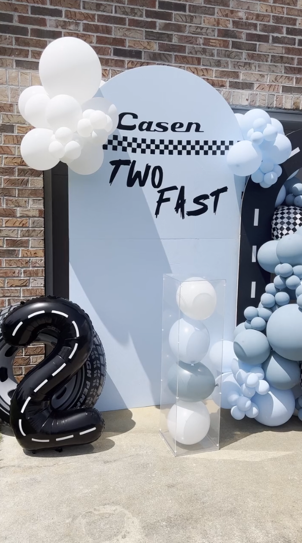 Car theme birthday backdrop with number 2 balloon