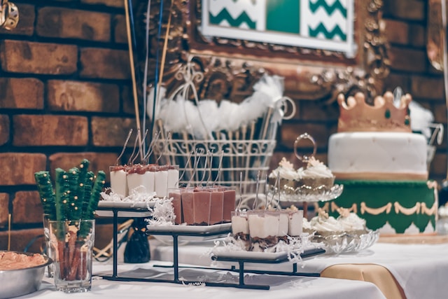 Dessert bar with cake stands and cupcake risers