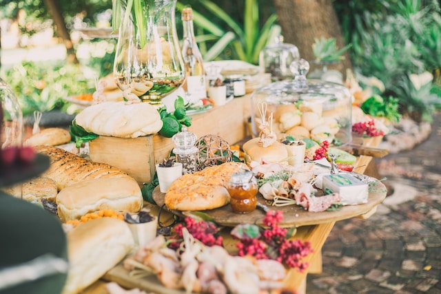 Farm to table buffet with cake stands and glass jars