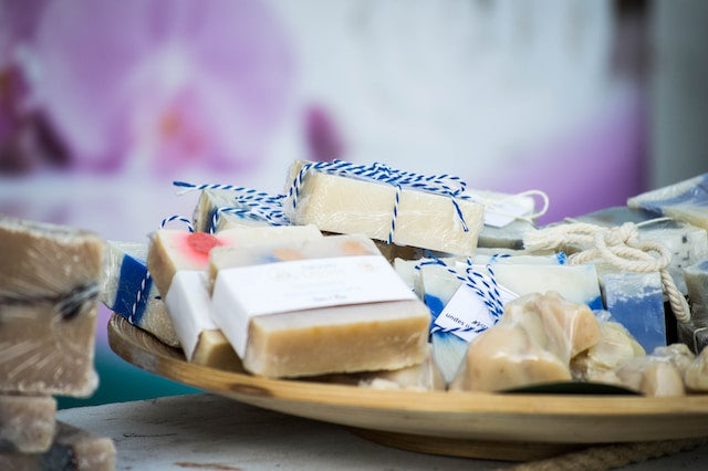 Party favors tied in blue ribbons