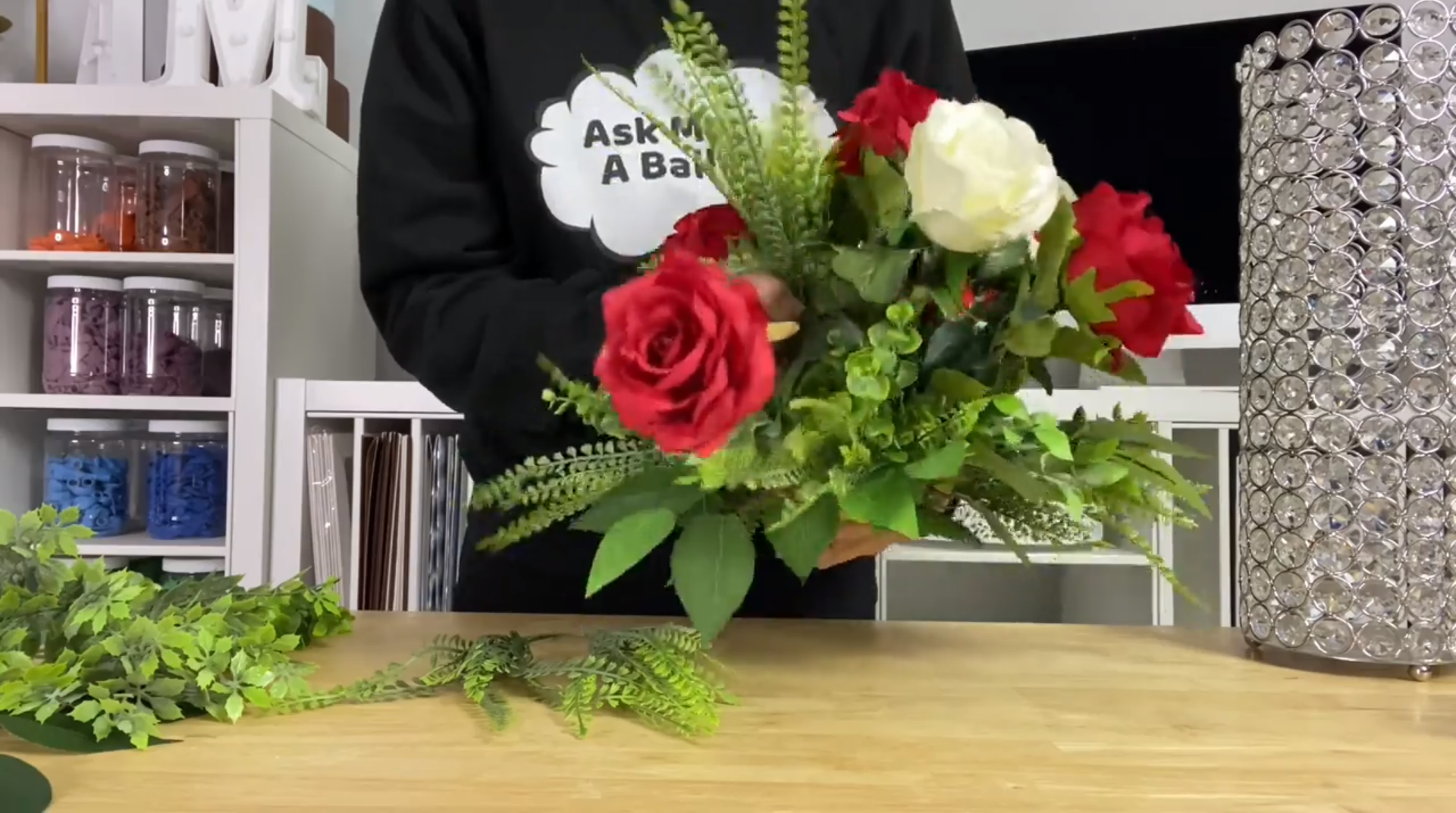 Adding more greenery to the rose centerpiece