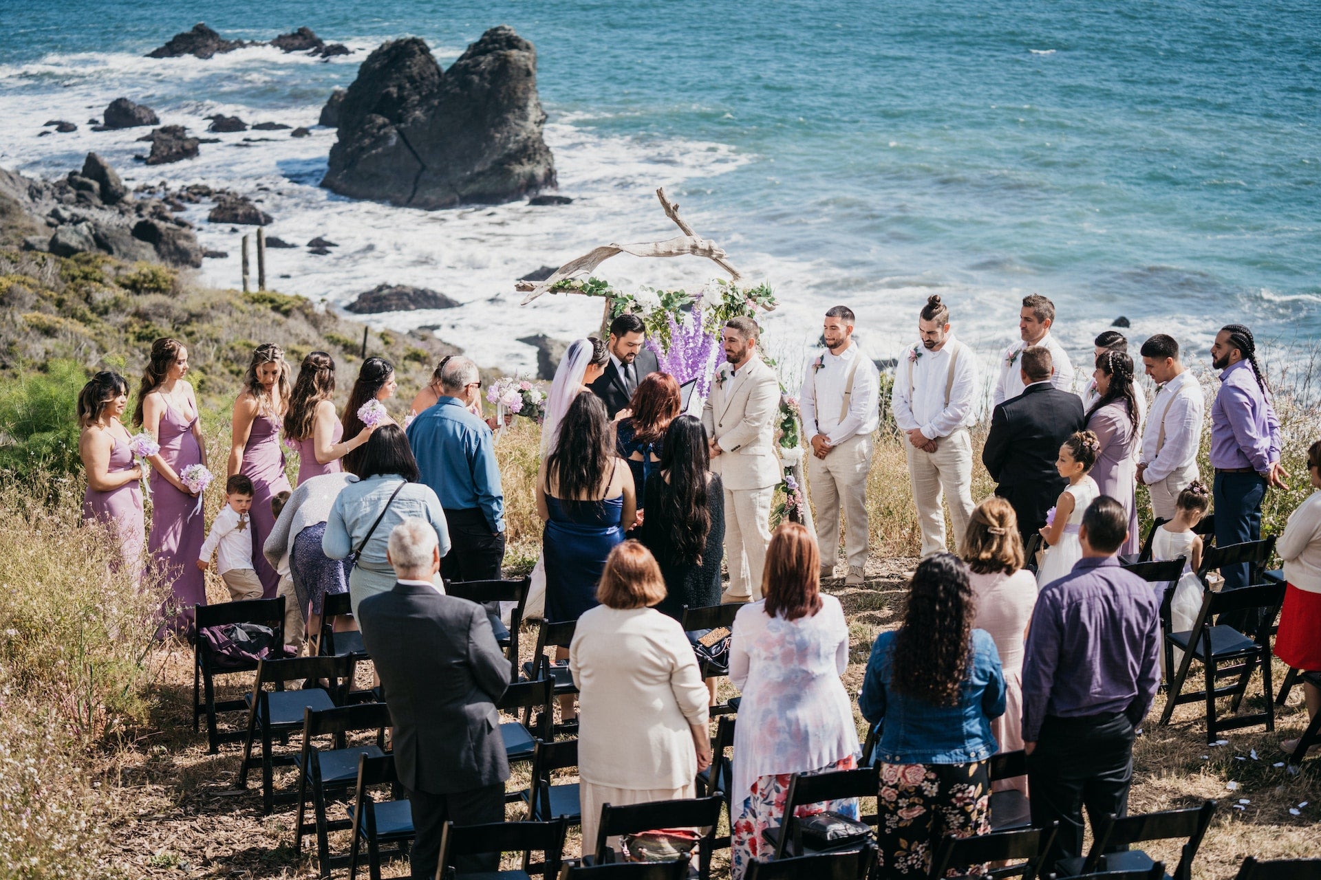 Wedding guests at the beach