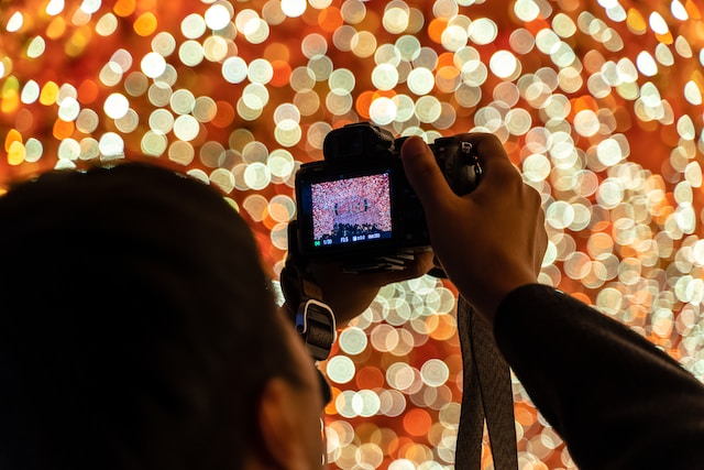 Photo taking against shimmering lights