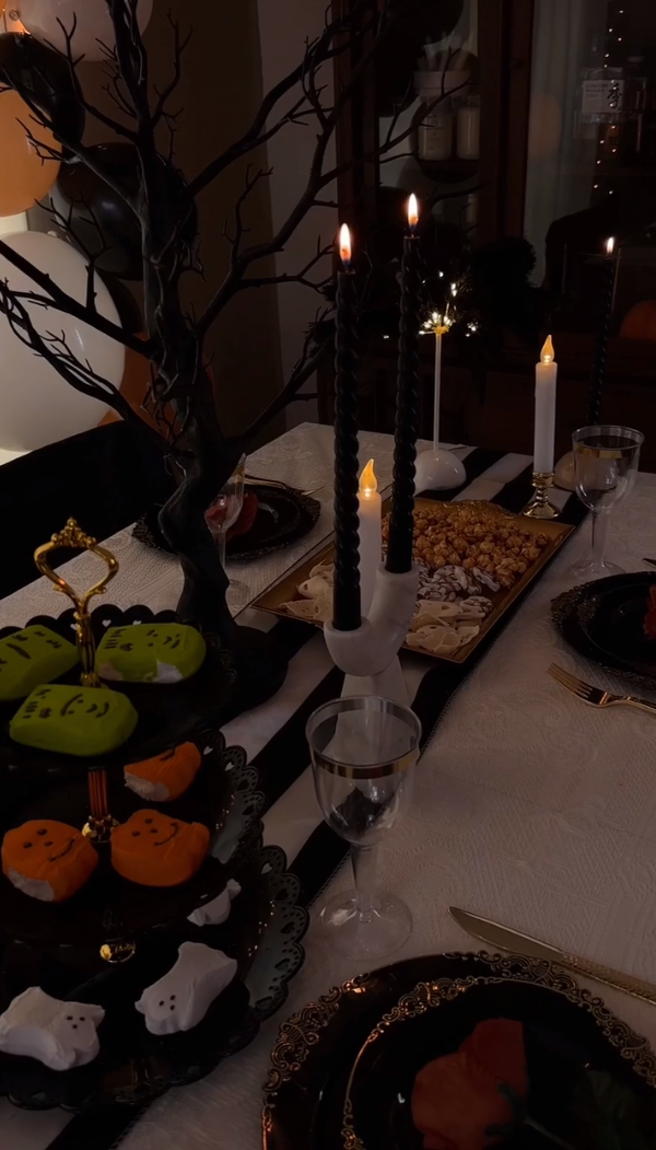 Dessert stand with centerpiece decor and candles