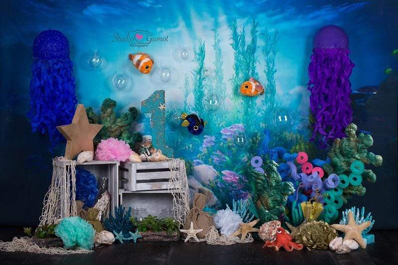 Underwater backdrop with sea creatures and decorations