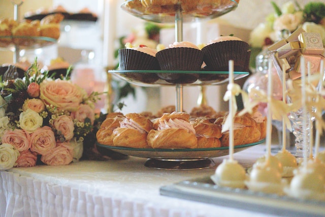 Desserts in cupcake stands and risers