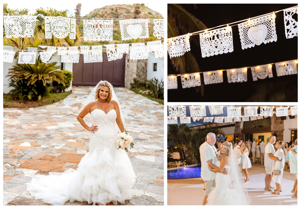 white papel picado wedding bunting; happy bride; people dancing