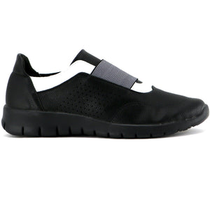 white sneakers black sole